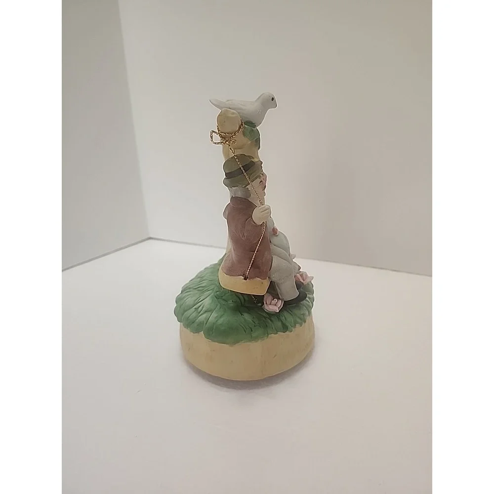 MSR Imports Inc. Porcelain Music Box Elderly‎ Couple on Swing. Writing On Bottom